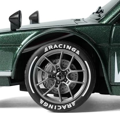 Close-up of 1/24 scale RC car silver wheel with simulated brake disc and racing tire details for BRRRRT drift car