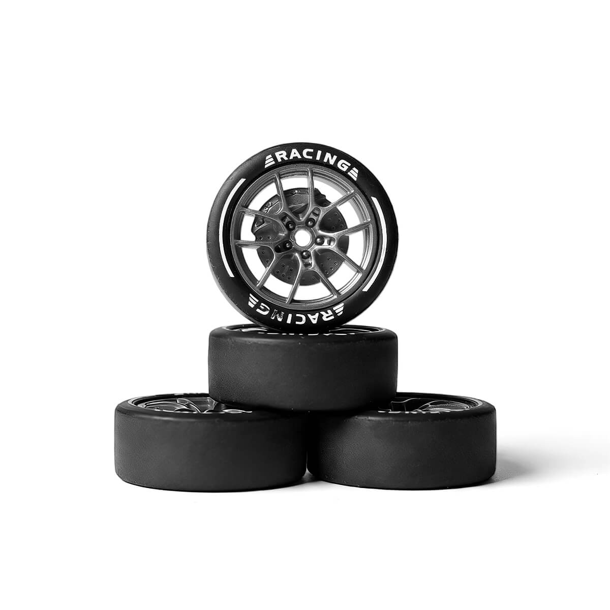 Set of 4 pre-mounted 1/24 RC car drift slick tires with hard plastic surface and silver rims for smooth drifting