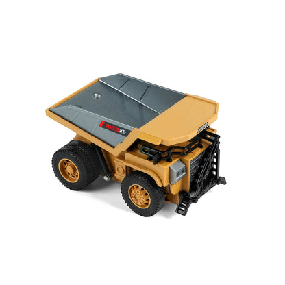Elevated front three-quarter view of the 1/64 diecast mini dump truck, showcasing the grey alloy dump bed, cab visor, and front grille details