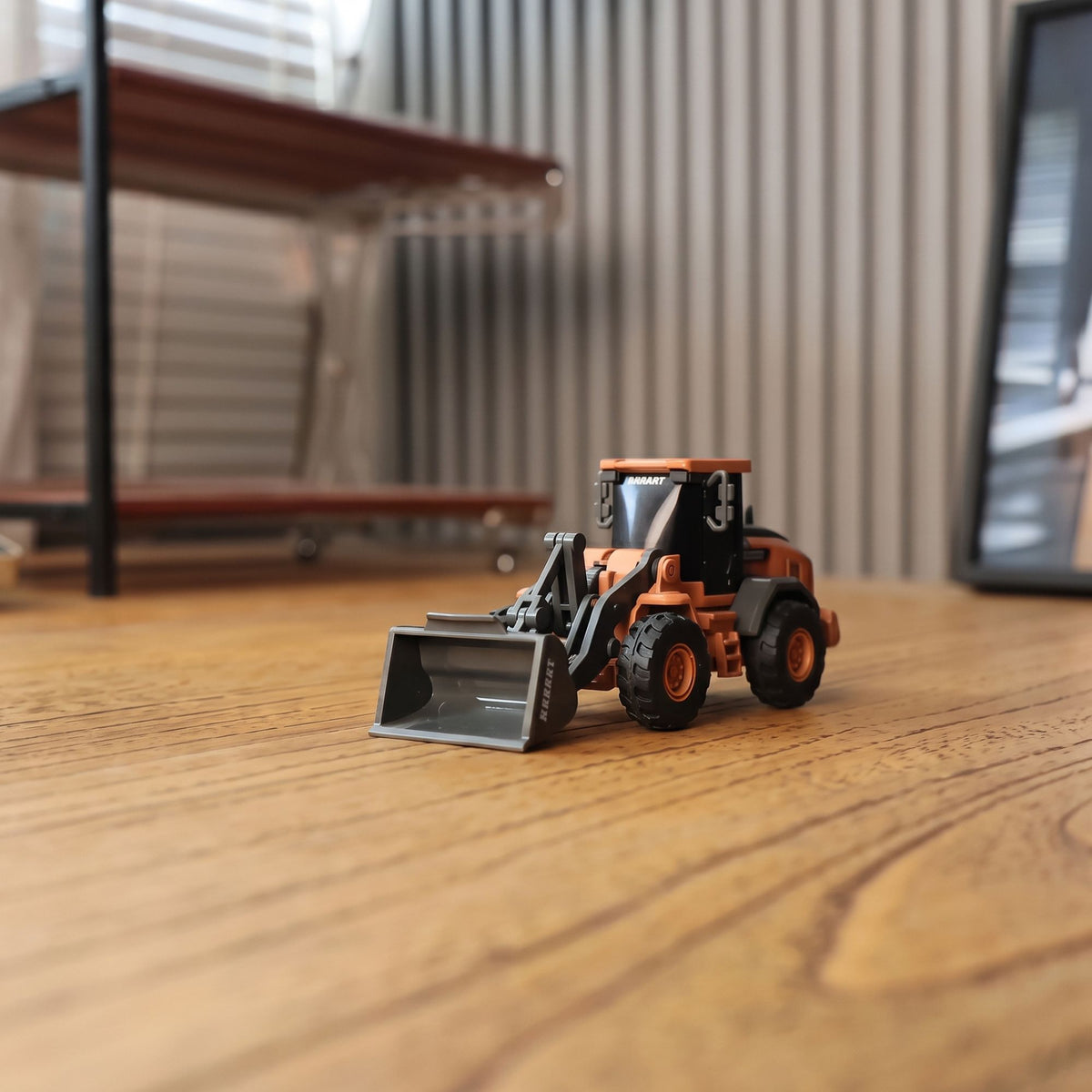 BRRRRT 1/64 Mini RC Wheel Loader on desk