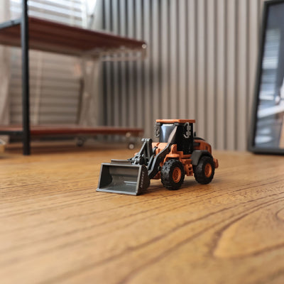 BRRRRT 1/64 Mini RC Wheel Loader on desk
