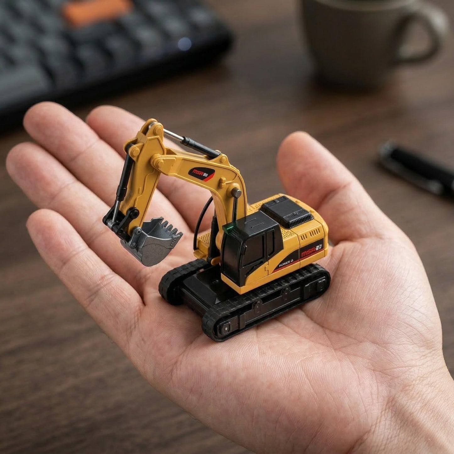 BRRRRT 1/64 Remote Control Mini Excavator on hand